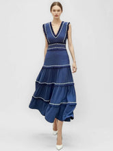 Robe longue bleu marine sans manches à pampilles
