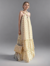 Robe longue fleurie unie à col suspendu