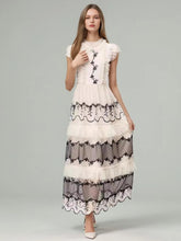 Robe longue imprimée à manches lanternes et col rond