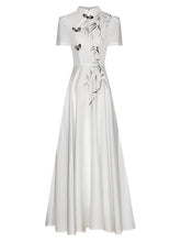 La robe à manches courtes Reese