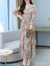 Robe longue de plage fleurie Aris