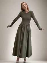 Robe trapèze à manches longues et poches ajourées