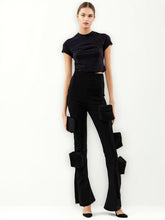 Hose mit Retro-Tasche und hohem Beinschlitz