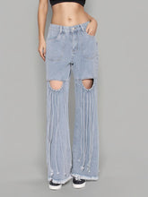 Jeans mit hoher Taille, ausgehöhlten Patchwork-Quasten