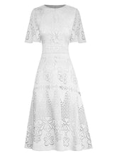 Robe mi-longue trapèze à grandes fleurs Nicole Hook