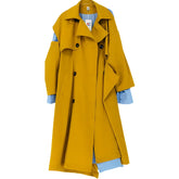 Der langärmlige gespleißte Trenchcoat „The Canary“