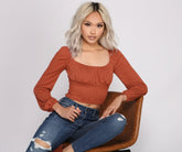 Haut élégant à manches bouffantes et froncées