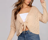 Pull noué sur le devant pour un tricot douillet