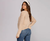 Pull noué sur le devant pour un tricot douillet