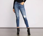 High Rise Skinny Jeans mit Knieschlitz