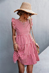 Robe à volants et épaules à carreaux vichy