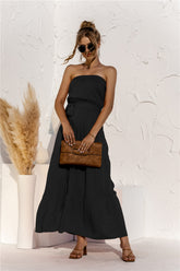 Robe longue bustier à volants et taille nouée