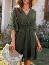 Robe courte à pois et manches évasées