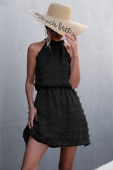Robe sans manches à pois suisses et à nouer dans le dos