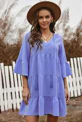 Robe à volants à volants et à nouer avec des pampilles