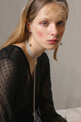 Halskette mit Quaste und Kristall-Strass