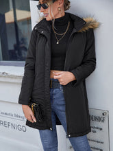 Doudoune à capuche avec bordure en fausse fourrure