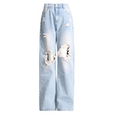 Jean boyfriend décontracté à taille haute et jambe droite avec détails déchirés et effet usé