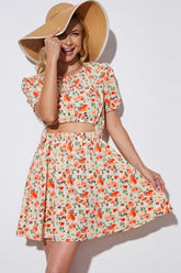 Robe à manches courtes bouffantes et découpes florales