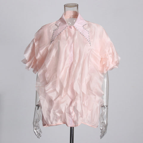 Chemise à volants superposés avec col rabattu et diamants