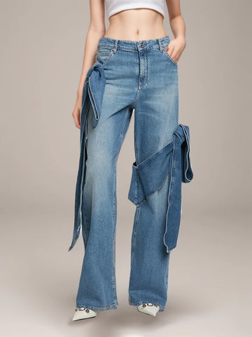 Jean taille basse avec nœuds papillon Pantalon large