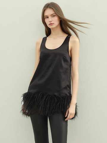 Gilet antitache avec bordure en plumes