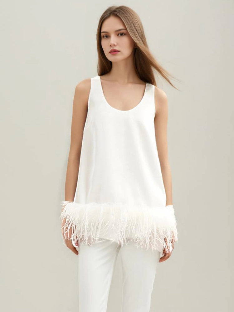 Gilet antitache avec bordure en plumes