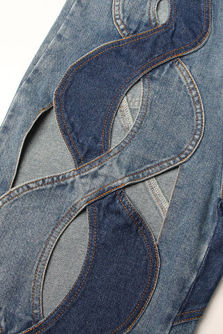 DEUX JEANS DÉCOUPÉS EN DENIM DIFFÉRENTS