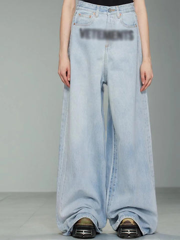 Pantalon en denim taille haute à jambe large et broderie rétro