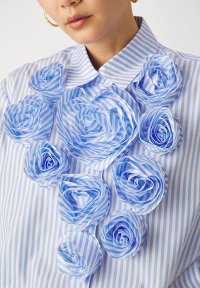 ROMANTIC ROSETTE APPLIQUE COLLARED BUTTON UP LONG SLEEVE CREPE COTTON SHIRT - BLUE