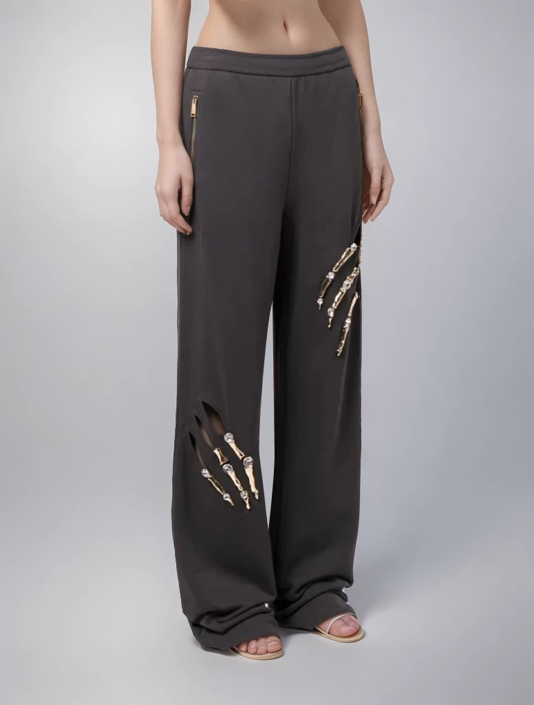 Pantalon large à empiècements creux et diamants