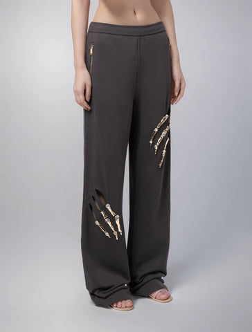 Pantalon large à empiècements creux et diamants