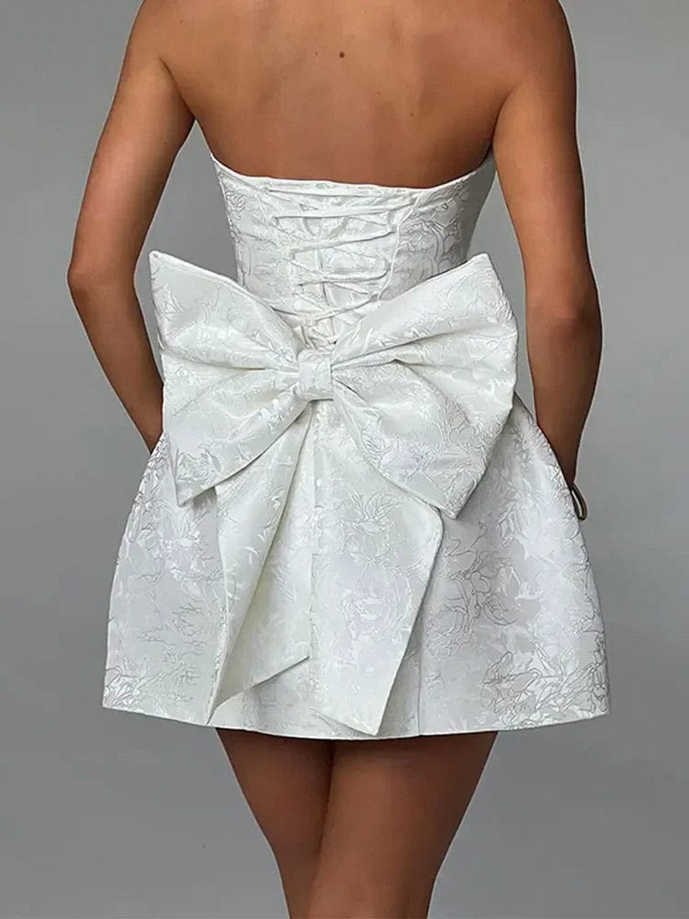 Harper Sleeveless Bow Embellished Mini Dress