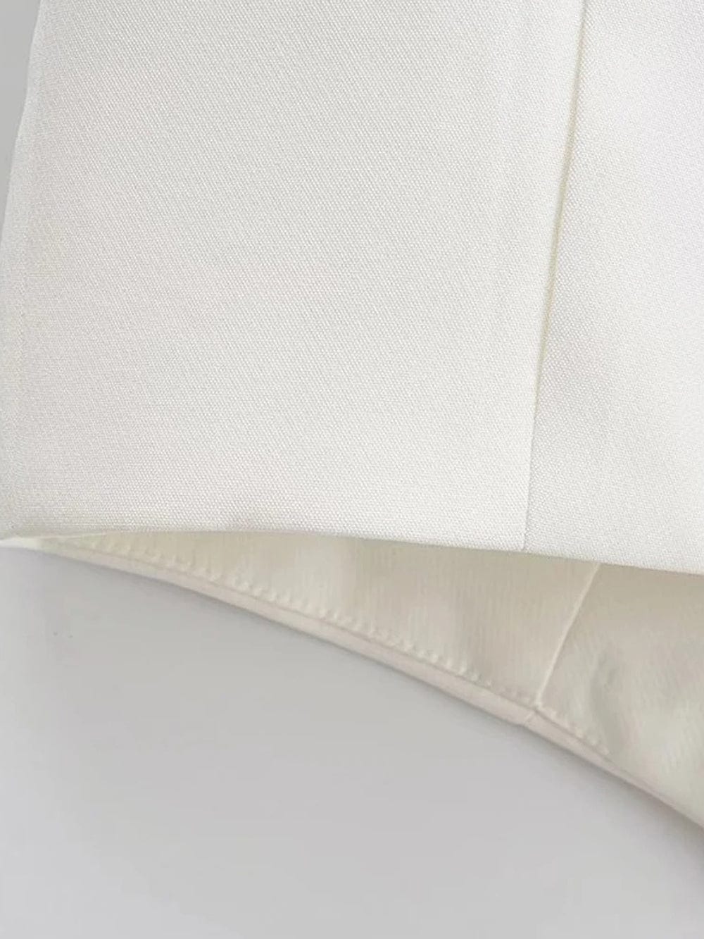 Olivia Button Cropped Sleeveless Chic Top