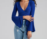 Wrapped In Chic Bell Sleeve Top