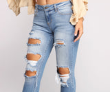 Mid Rise Frayed Cropped Skinny Jeans
