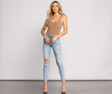 Mid Rise Destructed Skinny Jeans