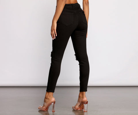 High Rise Skinny Jeans mit Knieschlitz