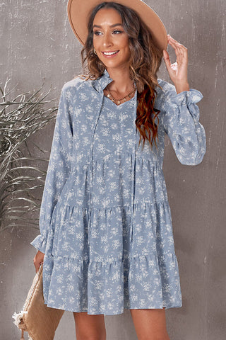 Robe babydoll fleurie à volants et col noué