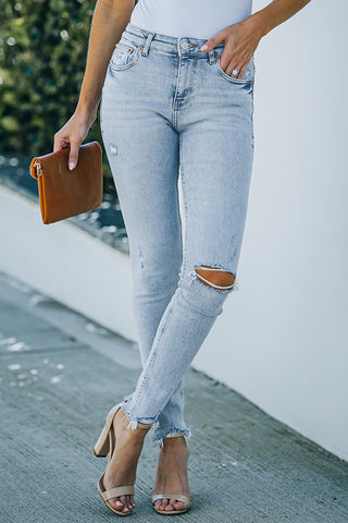 Light Wash Distressed Skinny Jeans with Pockets