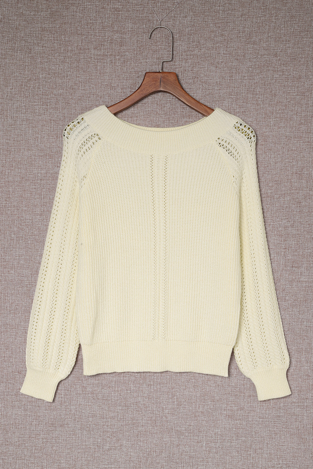 Pull à manches raglan en maille côtelée ajourée