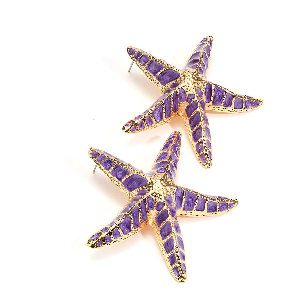 Boucles d'oreilles étoiles de mer violettes