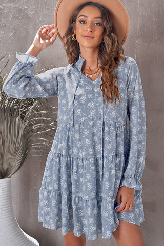 Robe babydoll fleurie à volants et col noué