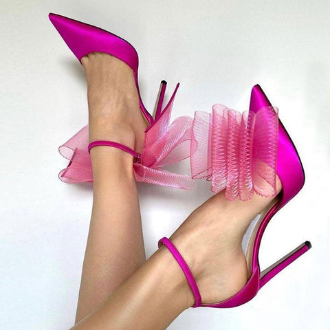 Asymmetrische Stiletto-Pumps mit spitzer Zehenpartie und Fesselriemchen und Schleifendetail - Fuchsia