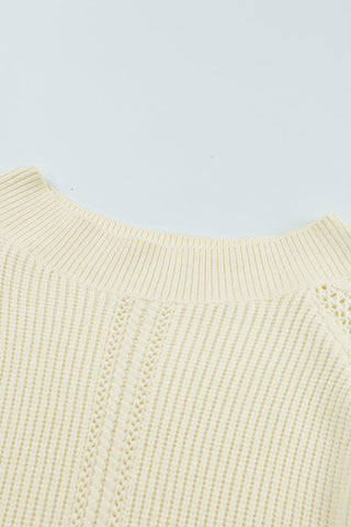 Pull à manches raglan en maille côtelée ajourée